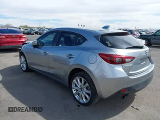 2015 Mazda 3 S Grand Touring with VIN JM1BM1M38F1256560, listed as a IAAI auction lot 41655332 with 121,179 mi miles and . Bid and sale history available at DreamBid. Image 3.