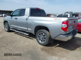 2018 Toyota Tundra 2WD SR with VIN 5TFRM5F16JX133735, listed as a IAAI auction lot 41818455 with 148,456 mi miles. Bid and sale history available at carsss.com. Image 3.