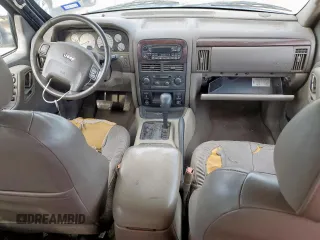 2004 Jeep Grand Cherokee with VIN 1J8GX58J54C121513, listed as a Copart auction lot 59384005 with 221,397 mi miles and Salvage title. Bid and sale history available at DreamBid. Image 8.