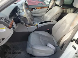 2007 Mercedes-Benz E 550 with VIN WDBUF90X77X212587, listed as a Copart auction lot 79753664 with 111,768 mi miles and Salvage Title. Bid and sale history available at carsss.com. Image 7.