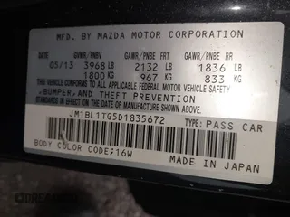 2013 Mazda 3 i SV with VIN JM1BL1TG5D1835672, listed as a IAAI auction lot 42009884 with 96,097 mi miles. Bid and sale history available at carsss.com. Image 9.