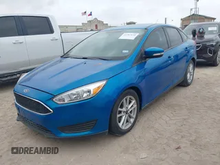 2016 Ford Focus SE z VIN 1FADP3F27GL395235, wystawiony jako IAAI lot #41707132 z przebiegiem 114 897 mil mil oraz . Historia ofert i sprzedaży dostępna na DreamBid. Obrazek 2.