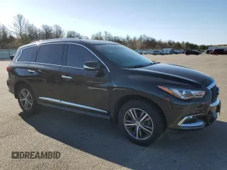 2017 Infiniti QX60 with VIN 5N1DL0MM6HC554882, listed as a Copart auction lot 54297515 with 82,996 mi miles and Salvage Title. Bid and sale history available at DreamBid. Image 4.