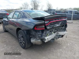 2018 Dodge Charger GT with VIN 2C3CDXJG2JH330696, listed as a IAAI auction lot 42085981 with 113,155 mi miles. Bid and sale history available at carsss.com. Image 3.