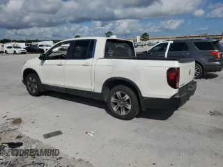 2017 Honda Ridgeline RTL with VIN 5FPYK2F53HB001434, listed as a Copart auction lot 58414335 with 187,711 mi miles and Salvage title. Bid and sale history available at DreamBid. Image 2.