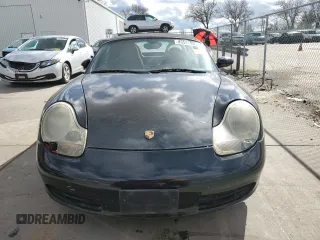2000 Porsche Boxster z VIN WP0CA2988YU627807, wystawiony jako Copart lot #45522955 z przebiegiem 120 384 mil mil oraz Szkody całkowita. Historia ofert i sprzedaży dostępna na DreamBid. Obrazek 5.
