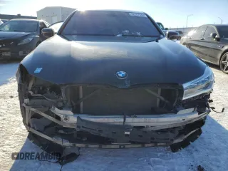 2016 BMW 7 Series 750i xDrive with VIN WBA7B0C50GG526899, listed as a Copart auction lot 46712485 with 97,985 mi miles and Salvage title. Bid and sale history available at DreamBid. Image 5.