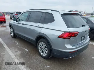 2019 Volkswagen Tiguan S with VIN 3VV1B7AX9KM110873, listed as a IAAI auction lot 42010931 with 82,745 mi miles and . Bid and sale history available at DreamBid. Image 3.