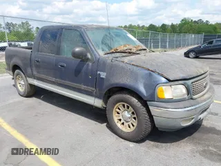 2003 Ford F-150 XLT with VIN 1FTRW076X3KC61967, listed as a IAAI auction lot 42016065 with 206,256 mi miles. Bid and sale history available at carsss.com. Image 1.