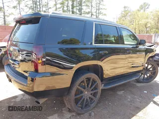 2020 Chevrolet Tahoe LT with VIN 1GNSKBKC7LR159742, listed as a IAAI auction lot 41854694 with 112,087 mi miles and . Bid and sale history available at DreamBid. Image 4.
