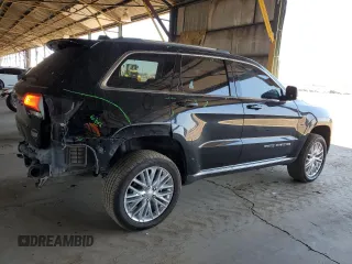 2018 Jeep Grand Cherokee Summit with VIN 1C4RJFJT4JC344141, listed as a Copart auction lot 57123685 with 86,893 mi miles and Salvage title. Bid and sale history available at DreamBid. Image 3.