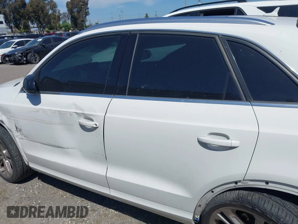2015 Audi Q3 2.0T Premium Plus with VIN WA1EFCFS9FR002651, listed as a IAAI auction lot 41755613 with 111,281 mi miles. Bid and sale history available at carsss.com. Image 15.