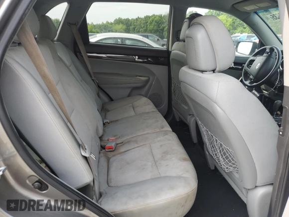 2013 Kia Sorento LX with VIN 5XYKT3A14DG386074, listed as a Copart auction lot 59879935 with 163,427 mi miles and Salvage title. Bid and sale history available at DreamBid. Image 11.
