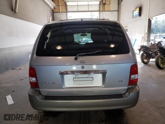 2004 Kia Sedona LX with VIN KNDUP131946569536, listed as a Copart auction lot 82963493 with 119,901 mi miles and Clean Title. Bid and sale history available at carsss.com. Image 6.