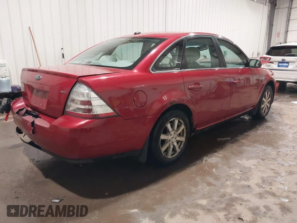 2009 Ford Taurus SEL with VIN 1FAHP24W89G123452, listed as a IAAI auction lot 41335622 with 229,182 mi miles. Bid and sale history available at carsss.com. Image 4.
