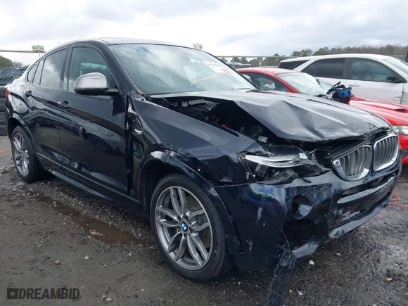2018 BMW X4 M40i with VIN 5UXXW7C52J0W63809, listed as a IAAI auction lot 41715259 with NaN miles. Bid and sale history available at carsss.com. Image 13.