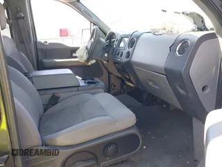 2005 Ford F-150 XLT with VIN 1FTPW14595FB23003, listed as a IAAI auction lot 41881364 with 228,464 mi miles. Bid and sale history available at carsss.com. Image 5.