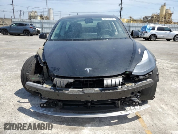 2023 Tesla Model 3 z VIN 5YJ3E1EA7PF549051, wystawiony jako Copart lot #58932765 z przebiegiem 8 800 mil mil oraz Szkoda całkowita • Salvage title. Historia ofert i sprzedaży dostępna na DreamBid. Obrazek 5.