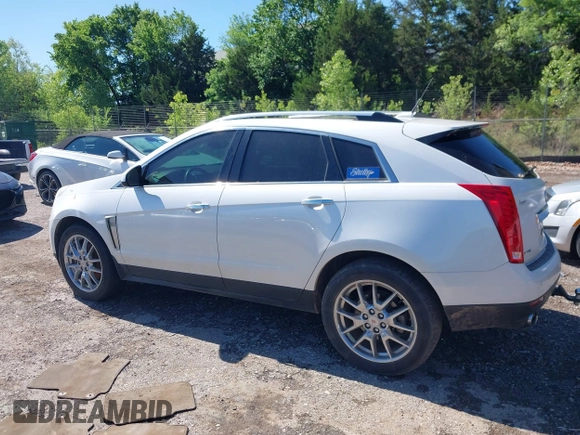 2013 Cadillac SRX Premium Collection with VIN 3GYFNEE33DS554556, listed as a IAAI auction lot 42152972 with 144,668 mi miles and . Bid and sale history available at DreamBid. Image 14.