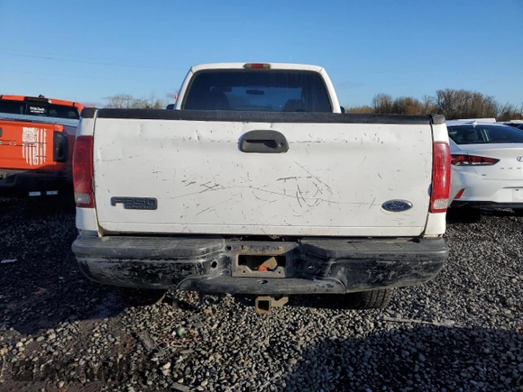 2003 Ford F-350 XL with VIN 1FTSX31P63EB62658, listed as a Copart auction lot 84054284 with 227,705 mi miles and Salvage Title. Bid and sale history available at DreamBid. Image 6.