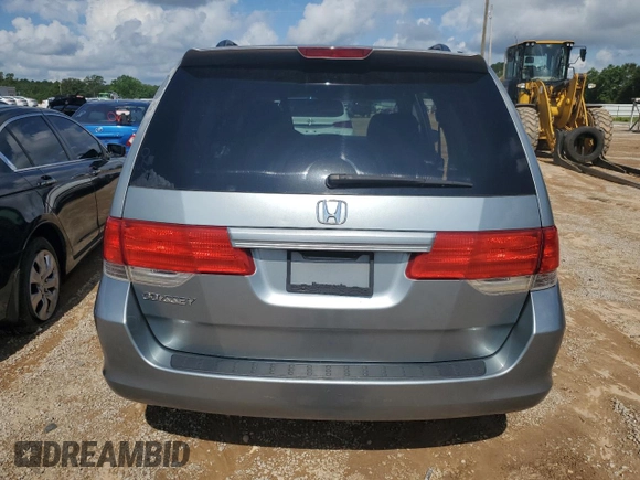 2010 Honda Odyssey EX with VIN 5FNRL3H42AB009924, listed as a Copart auction lot 58066365 with Not provided miles and Salvage title. Bid and sale history available at DreamBid. Image 6.
