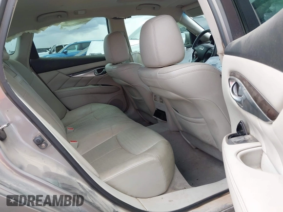 2012 Infiniti M with VIN JN1BY1AP3CM332453, listed as a IAAI auction lot 41944895 with 176,989 mi miles and . Bid and sale history available at DreamBid. Image 8.