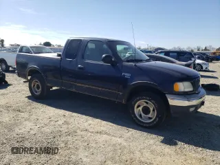 2000 Ford F-150 XL with VIN 1FTRX18W0YKB06899, listed as a Copart auction lot 46170175 with 252,042 mi miles and Salvage Title. Bid and sale history available at carsss.com. Image 4.