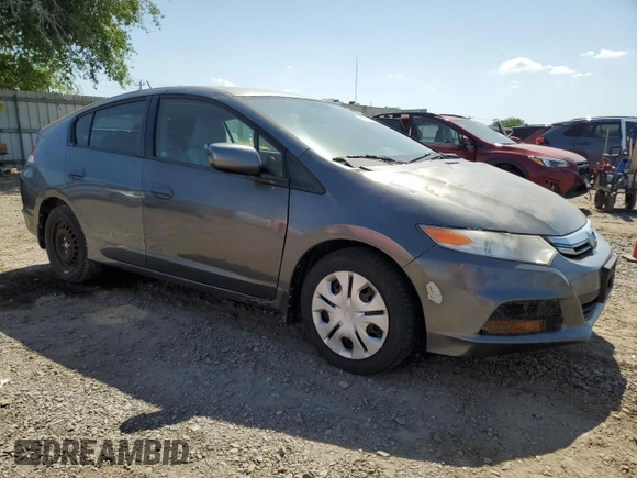 2012 Honda Insight z VIN JHMZE2H34CS003929, wystawiony jako Copart lot #52707885 z przebiegiem 131 596 mil mil oraz Szkoda całkowita • Salvage title. Historia ofert i sprzedaży dostępna na DreamBid. Obrazek 4.