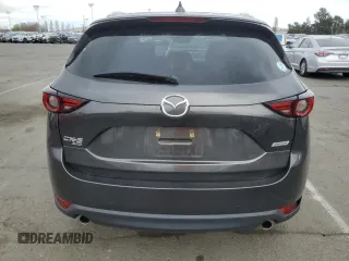 2018 Mazda CX-5 S Premium with VIN JM3KFBDM1J1352233, listed as a Copart auction lot 47082655 with 70,350 mi miles and Salvage Title. Bid and sale history available at DreamBid. Image 6.