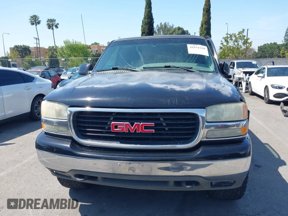2002 GMC Yukon SLT with VIN 1GKEC13T92R162978, listed as a IAAI auction lot 41851599 with 213,789 mi miles. Bid and sale history available at carsss.com. Image 12.