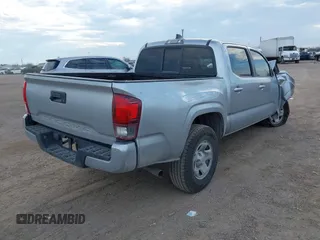 2022 Toyota Tacoma SR with VIN 3TYAX5GN8NT060017, listed as a IAAI auction lot 41504710 with 55,317 mi miles and . Bid and sale history available at DreamBid. Image 4.