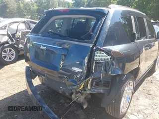 2015 Jeep Compass Latitude with VIN 1C4NJCEBXFD179373, listed as a IAAI auction lot 39380614 with 104,832 mi miles. Bid and sale history available at carsss.com. Image 6.