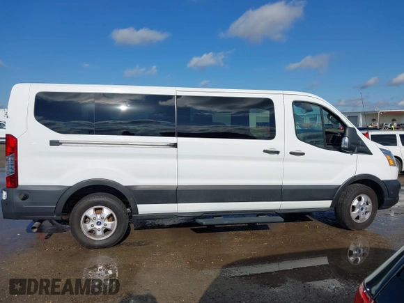 2020 Ford Transit Passenger XL with VIN 1FBAX2Y81LKA26321, listed as a IAAI auction lot 41110834 with Not provided miles and . Bid and sale history available at DreamBid. Image 13.