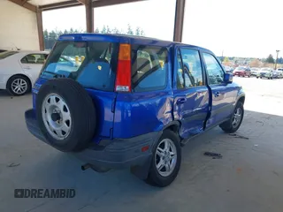 2001 Honda CR-V EX with VIN JHLRD18641C053166, listed as a IAAI auction lot 42078219 with 157,355 mi miles and . Bid and sale history available at DreamBid. Image 4.