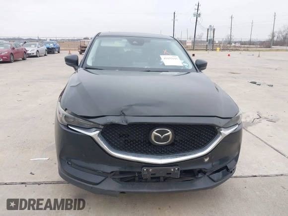 2017 Mazda CX-5 Grand Touring with VIN JM3KFADL9H0110985, listed as a IAAI auction lot 41435143 with 88,208 mi miles. Bid and sale history available at carsss.com. Image 6.
