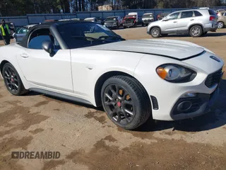 2018 FIAT 124 Spider Classica z VIN JC1NFAEK2J0139310, wystawiony jako IAAI lot #41406358 z przebiegiem 76 293 mil mil oraz . Historia ofert i sprzedaży dostępna na DreamBid. Obrazek 1.