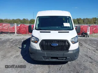 2023 Ford Transit Cargo with VIN 1FTBR2C8XPKA33372, listed as a IAAI auction lot 41735299 with 56,777 mi miles and . Bid and sale history available at DreamBid. Image 12.