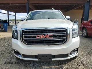 2015 GMC Yukon SLT with VIN 1GKS2BKC1FR736203, listed as a Copart auction lot 67977694 with 178,781 mi miles and Salvage Title. Bid and sale history available at carsss.com. Image 5.
