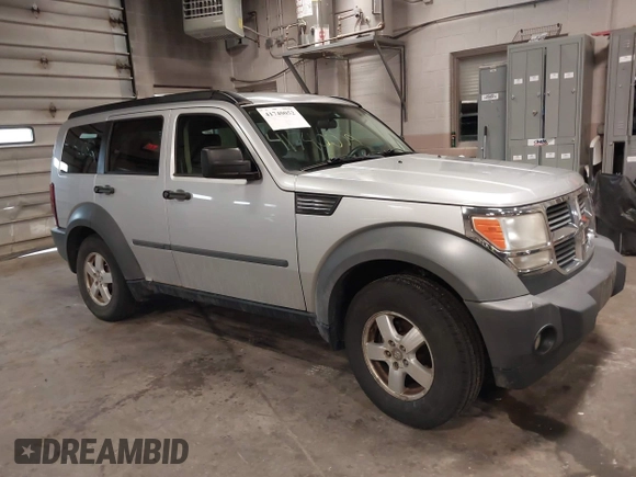 2007 Dodge Nitro SXT with VIN 1D8GU28K47W569317, listed as a IAAI auction lot 41740052 with 220,265 mi miles. Bid and sale history available at carsss.com. Image 1.