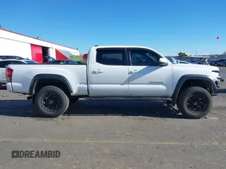 2017 Toyota Tacoma SR5 with VIN 3TMDZ5BN3HM023813, listed as a IAAI auction lot 41522828 with 128,533 mi miles and . Bid and sale history available at DreamBid. Image 14.