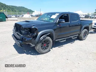 2019 Toyota Tacoma SR with VIN 5TFCZ5AN4KX208354, listed as a IAAI auction lot 42771410 with 77,509 mi miles and . Bid and sale history available at DreamBid. Image 18.
