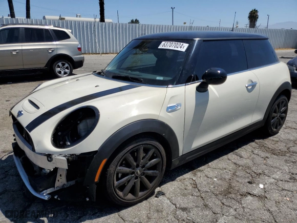2017 MINI Hardtop 2 Door Cooper S with VIN WMWXP7C57H3B93543, listed as a Copart auction lot 63707024 with 64,576 mi miles and Salvage Title. Bid and sale history available at carsss.com. Image 1.