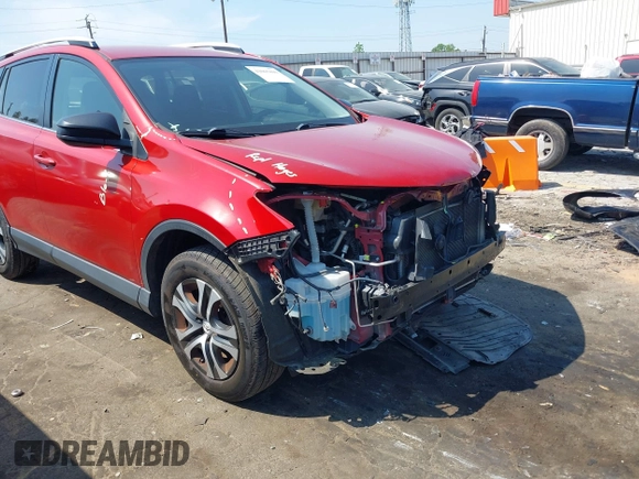 2016 Toyota RAV4 LE with VIN JTMZFREV1GJ098247, listed as a IAAI auction lot 42065800 with 199,172 mi miles and . Bid and sale history available at DreamBid. Image 18.