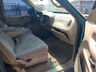 1998 Ford F-150 with VIN 1FTRX18L2WKA67414, listed as a IAAI auction lot 42583873 with 189,546 mi miles and . Bid and sale history available at DreamBid. Image 5.