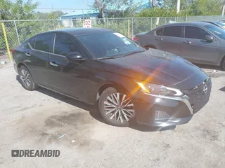 2023 Nissan Altima 2.5 SV with VIN 1N4BL4DV4PN339652, listed as a IAAI auction lot 41453604 with 51,694 mi miles. Bid and sale history available at carsss.com. Image 1.