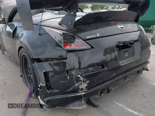 2004 Nissan 350Z Touring z VIN JN1AZ36A14M253275, wystawiony jako IAAI lot #42181345 z przebiegiem 63 886 mil mil oraz . Historia ofert i sprzedaży dostępna na DreamBid. Obrazek 6.