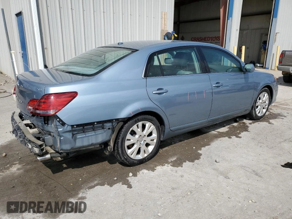2010 Toyota Avalon XL with VIN 4T1BK3DB3AU357047, listed as a Copart auction lot 52694255 with 130,749 mi miles and Salvage Title. Bid and sale history available at carsss.com. Image 3.