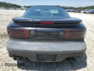 1999 Pontiac Firebird Formula z VIN 2G2FV22G4X2233748, wystawiony jako Copart lot #55693535 z przebiegiem 166 622 mil mil oraz Szkoda całkowita • Salvage title. Historia ofert i sprzedaży dostępna na DreamBid. Obrazek 6.