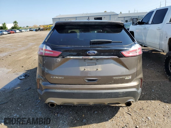 2019 Ford Edge Titanium with VIN 2FMPK4K97KBC02438, listed as a Copart auction lot 62679015 with 69,935 mi miles and Clean title. Bid and sale history available at DreamBid. Image 6.