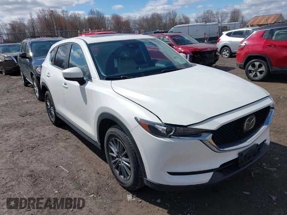 2019 Mazda CX-5 Touring with VIN JM3KFBCMXK0595905, listed as a IAAI auction lot 41934373 with 83,020 mi miles. Bid and sale history available at carsss.com. Image 1.